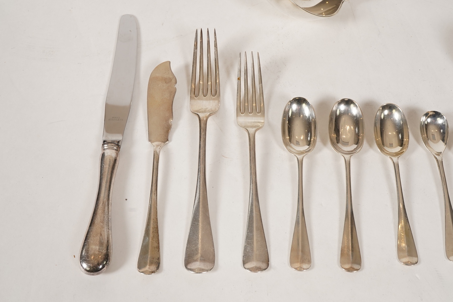 A George V canteen of silver Hanoverian rat tail flatware, by Mappin & Webb
